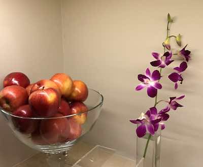 Relaxing at massage spa with apples and orchids